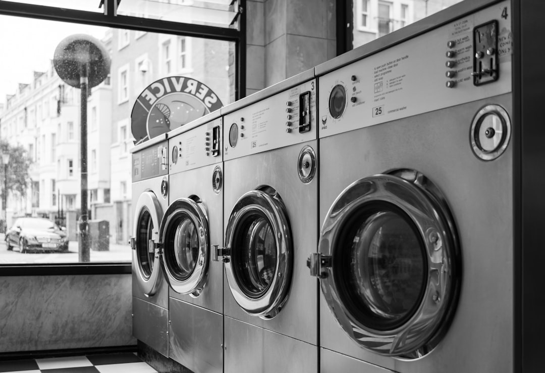 about-us a-row-of-washing-machines-cahdukkk2r8